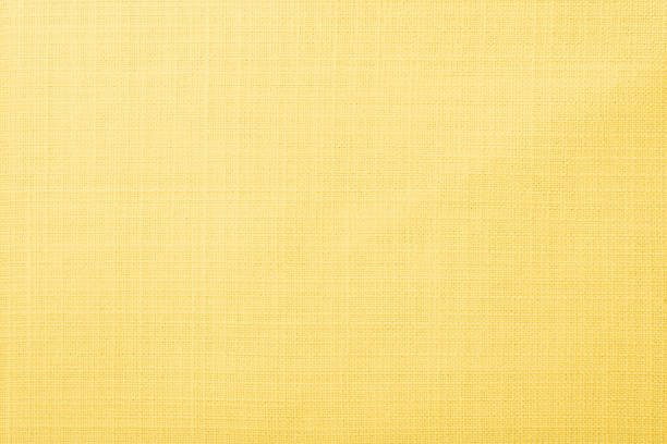 Soft yellow fabric background stock photo
