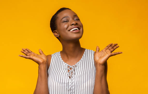 istock Super happy afro girl raising her hands up 1171062873