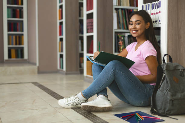 istock Young female graphic designer creating new project, sitting on floor 1171063170