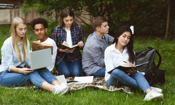 istock Group of students studying in college campus, preparing for classes 1171063977