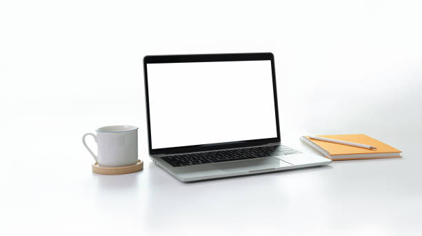istock Stylish minimal workplace with open blank screen laptop with white background 1171064410