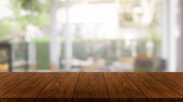 istock Wood table with blur background for product placement. 1171066056