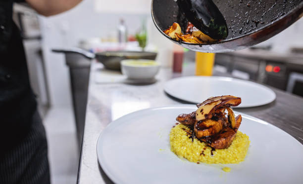 istock Skilled chef preparing gourmet food at the restaurant kitchen 1171068854