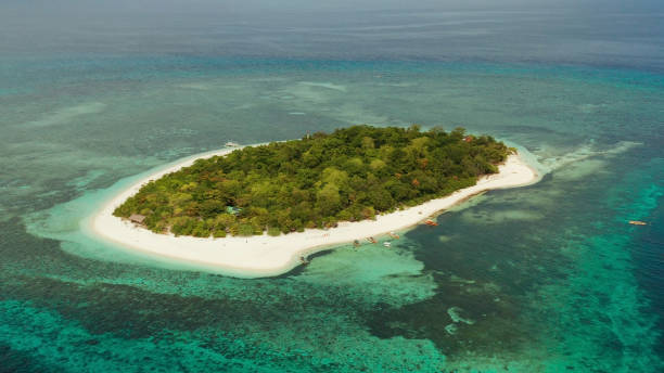 istock Tropical island with sandy beach. Mantigue Island, Philippines 1171076628