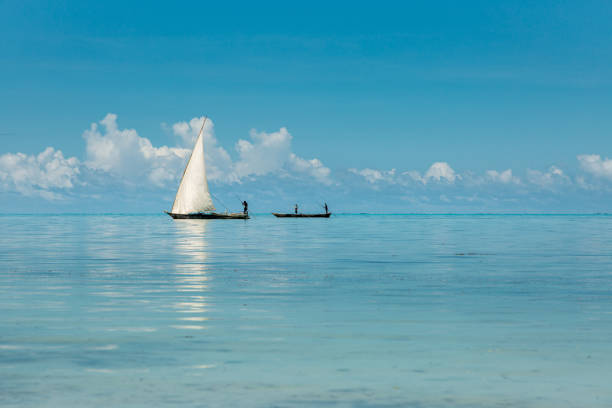 istock Two boats on calm ocean 1171084076