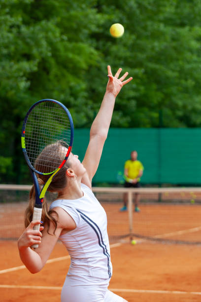 istock Young female tennis player serving. 1171084317