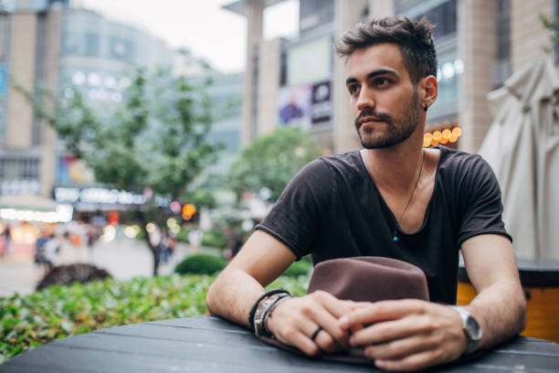 istock Young man in the cafe 1171084509