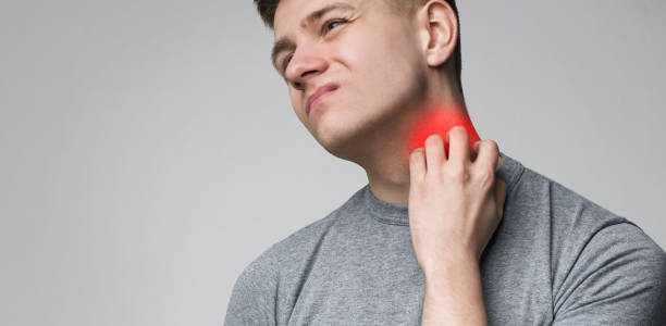 istock Young man scratching his itchy neck with allergy rash 1171085713