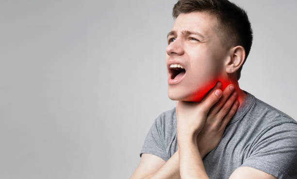 istock Sick man suffering from sore throat, lost his voice 1171086855
