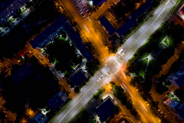 istock Flying over night city area 1171087622