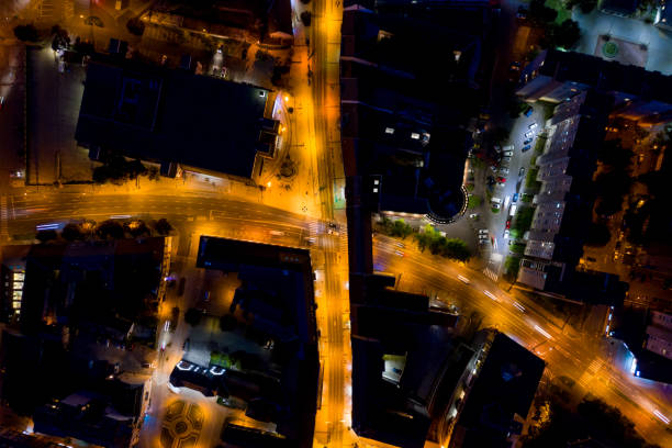 istock Flying over night city area 1171087630
