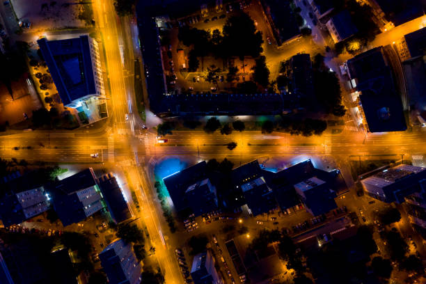 istock Flying over night city area 1171087651