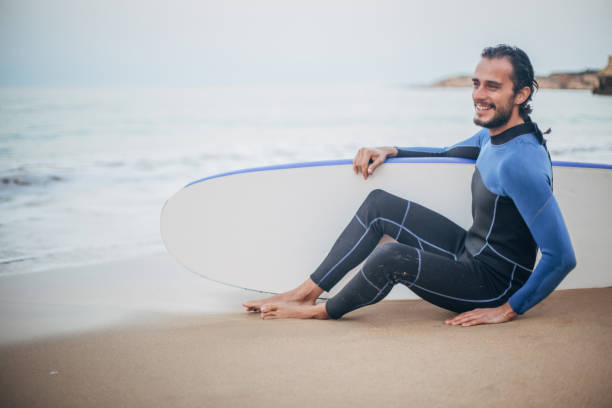 istock Surfer with surfboard in the wetsuit 1171088926