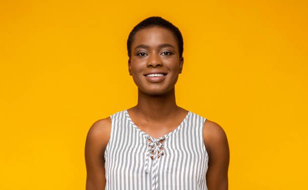 istock Young pretty black girl smiling at camera 1171091435