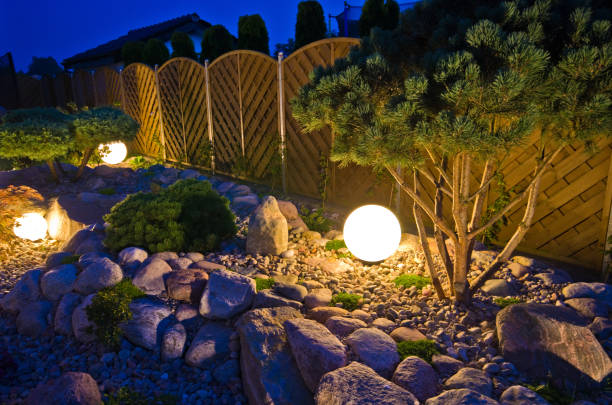 istock Home garden at night, illuminated by globe shaped lights 1171092462