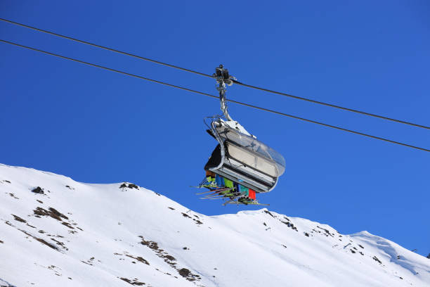 istock Skiers in the ski lift 1171092575