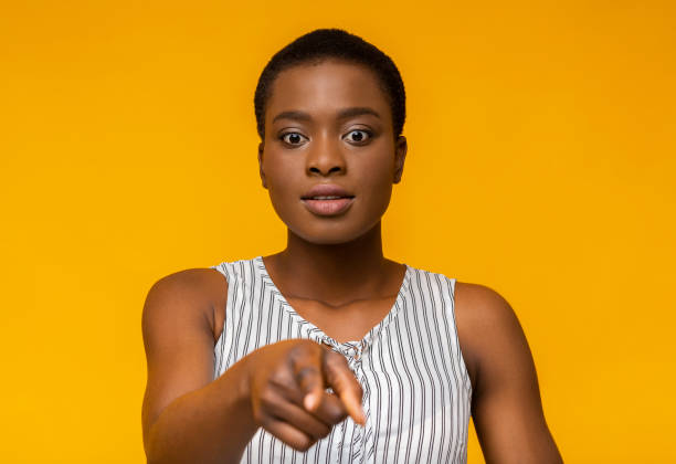 istock Scared african american girl pointing at camera 1171092694