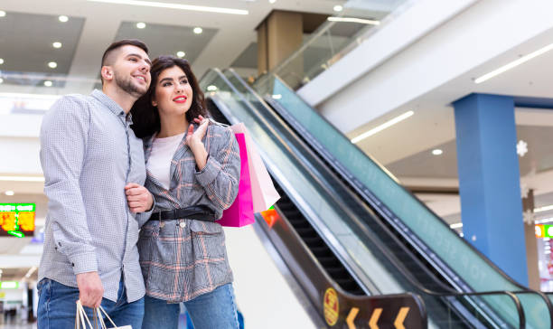 istock Loving couple spending time together after shopping 1171093098