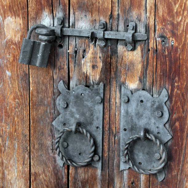 istock Old wooden doors. Door lock 1171095852