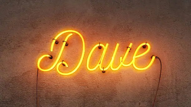 Neon sign that says the name Dave in bright red/orange on a grunge concrete background