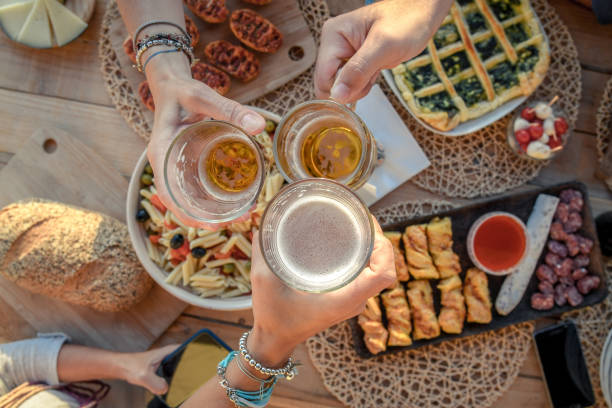 istock High Angle View Of People Toasting Drinks On Table 1171113742
