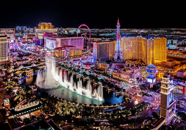 •Aerial view of Las Vegas Strip at night in Nevada Las Vegas, USA - February 23, 2019 Aerial view of Las Vegas Strip night time in Nevada. The famous Las Vegas Strip with the Bellagio Fountain The Strip is home to the largest hotels and casinos in the world. the strip las vegas stock pictures, royalty-free photos & images