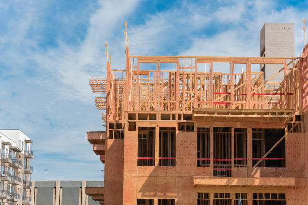 istock High-rise apartment under construction near completed building in Dallas, Texas 1171120181