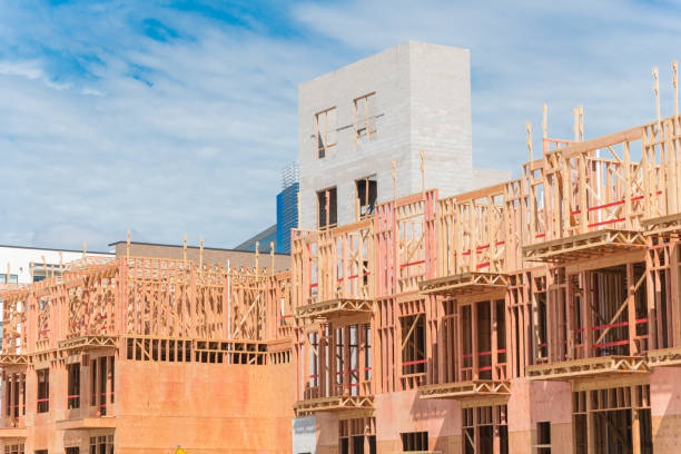 istock Modern apartment building under construction with wooden framework near Dallas 1171121028