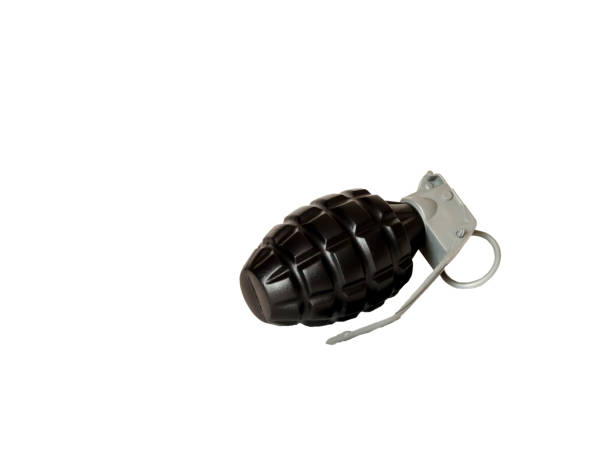 istock hand toy lemon grenade on a white background 1171121895