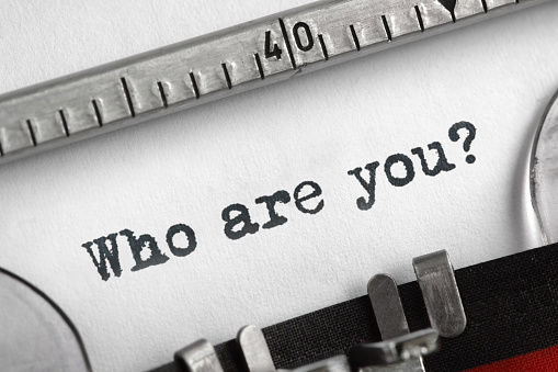 Who are you typed on an old typewriter concept for self belief, positive attitude and  identity