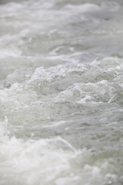 istock blurred and Double bokeh sponge and tsunami is blowing to the shore 1171122895