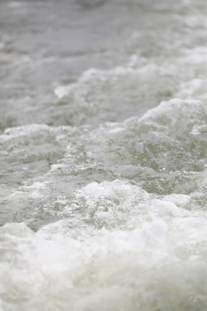 istock blurred and Double bokeh sponge and tsunami is blowing to the shore 1171122897