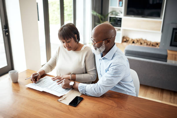 istock Coming up with a plan to better manage their finances 1171124414
