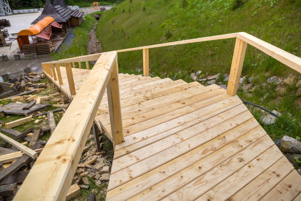 istock New wooden stairs outdoors. Carpenters work. 1171124713