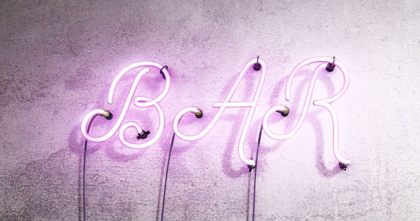 istock Neon sign saying the word Bar, pub sign on a concrete wall 1171127631