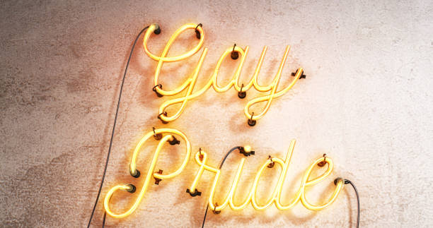 istock Red bright neon sign that says Gay Pride on a grey concrete wall background. 1171128744