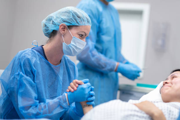 istock Doctor holding patient's hand before surgery 1171128927