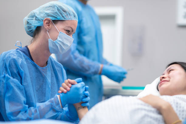 istock Doctor holding patient's hand before surgery 1171128932