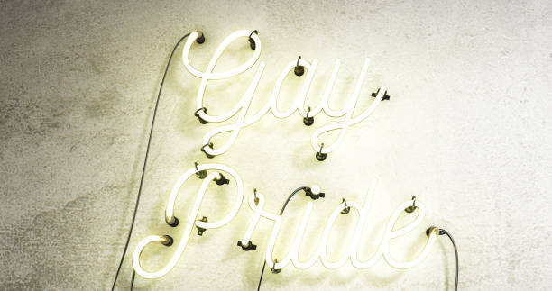 istock Bright neon sign that says Gay Pride on a grey concrete wall background. 1171129009