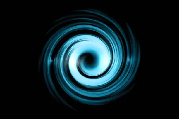 Photo of Glowing spiral tunnel with light blue cloud on black sky background