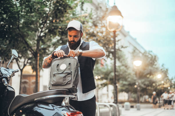 Fashionable, urban guy architect commuting to work