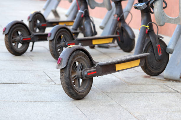 istock Electric scooters parked on a street 1171133543