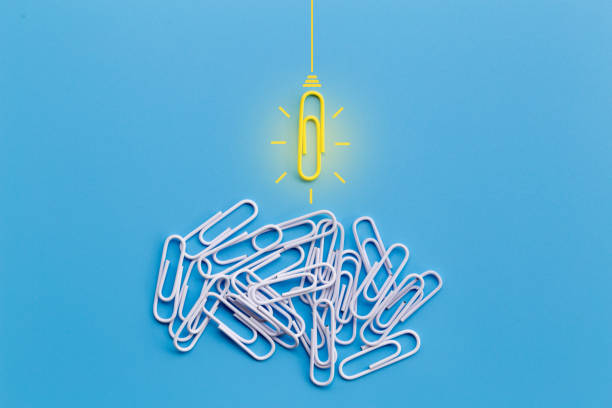 istock Great ideas concept with paperclip,thinking,creativity,light bulb on blue background,new ideas concept. 1171133904