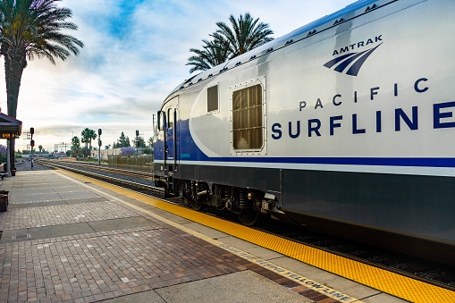 Fullerton, CA / USA – May 25, 2019: Amtrak Surfliner train stopped at the Fullerton, California train Station which is located at 120 East Santa Fe Avenue.