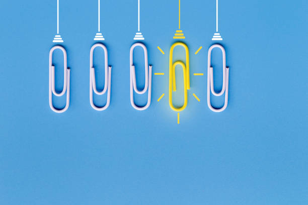 istock Great ideas concept with paperclip,thinking,creativity,light bulb on blue background,new ideas concept. 1171133951