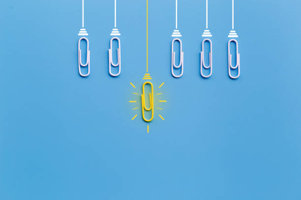istock Great ideas concept with paperclip,thinking,creativity,light bulb on blue background,new ideas concept. 1171134517