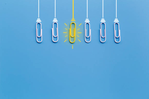 istock Great ideas concept with paperclip,thinking,creativity,light bulb on blue background,new ideas concept. 1171134530