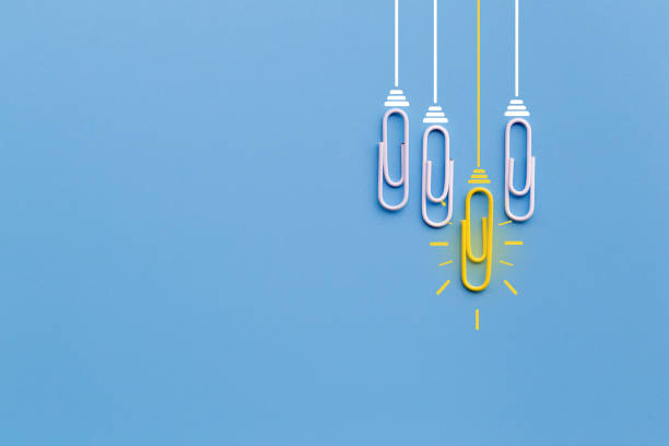 istock Great ideas concept with paperclip,thinking,creativity,light bulb on blue background,new ideas concept. 1171134579