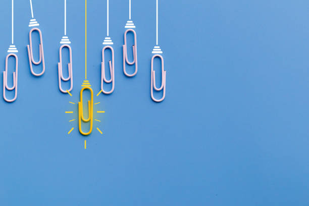 istock Great ideas concept with paperclip,thinking,creativity,light bulb on blue background,new ideas concept. 1171134731