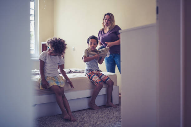 istock Mother preparing kids for school 1171134807